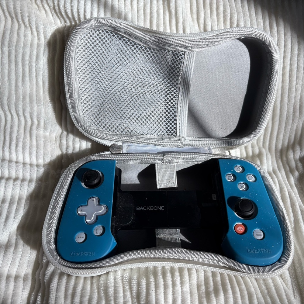Blue and Black Handheld Gaming Controller